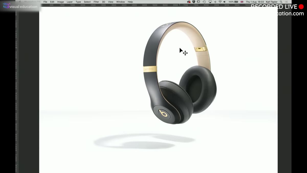 Headphones hanging from grip arm on low Avenger stand