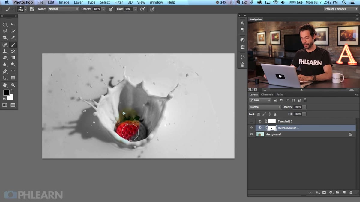Black brush painting over strawberry on layer mask