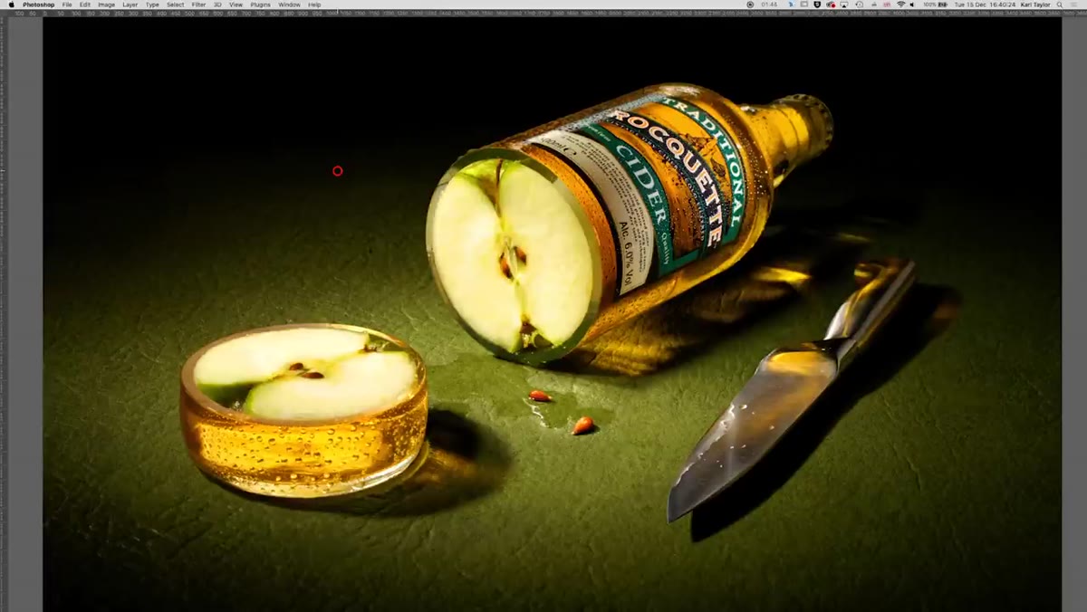 Cut bottle with apple inside replacing the full bottle