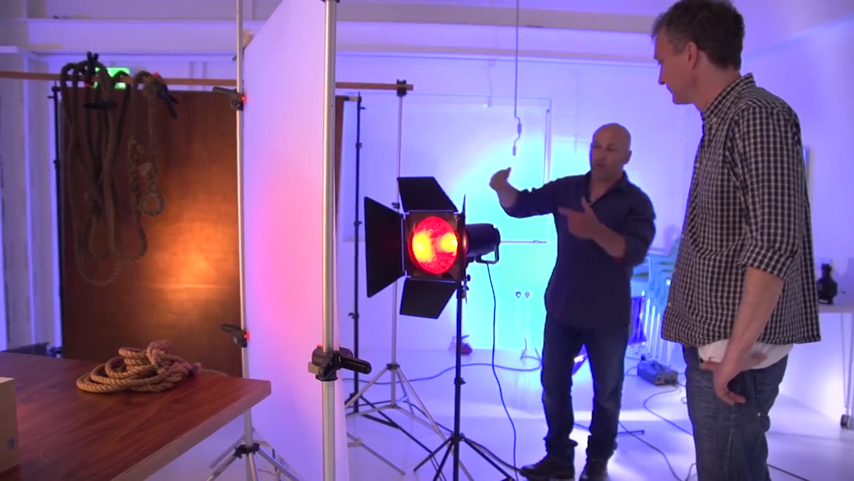 Red gel on Siros light aimed through diffusion material at bottle edge