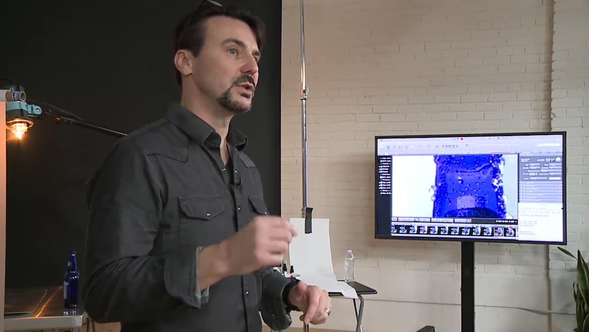 Rob explaining amber versus blue color competition inside bottle