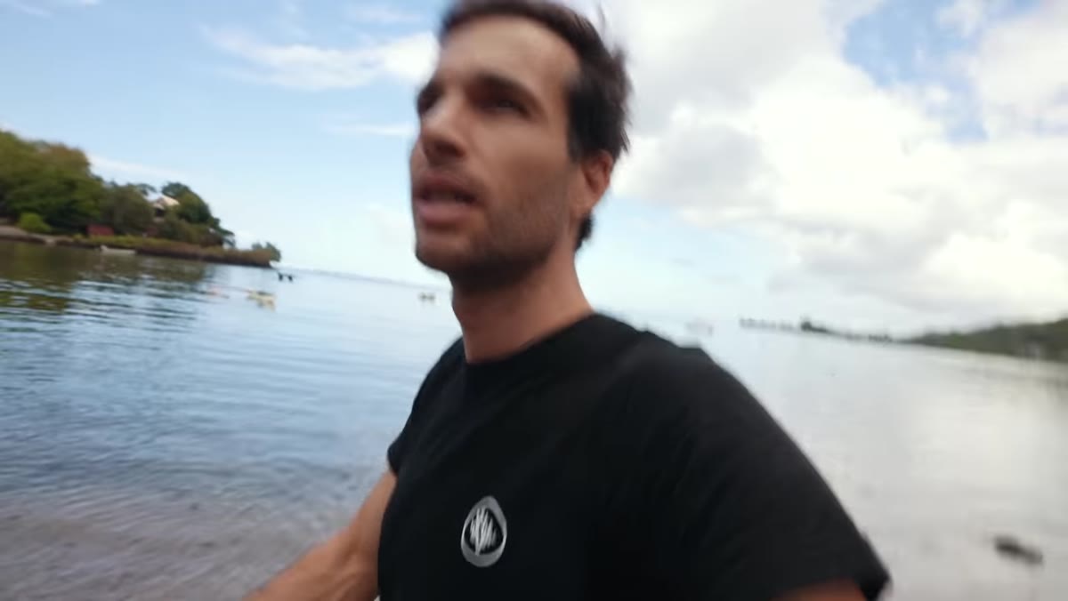 Pierre evaluating the scene with flat midday light overhead