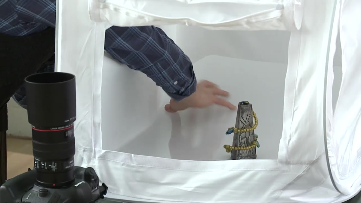 Andrew adjusting the Velcro sweep inside the light tent