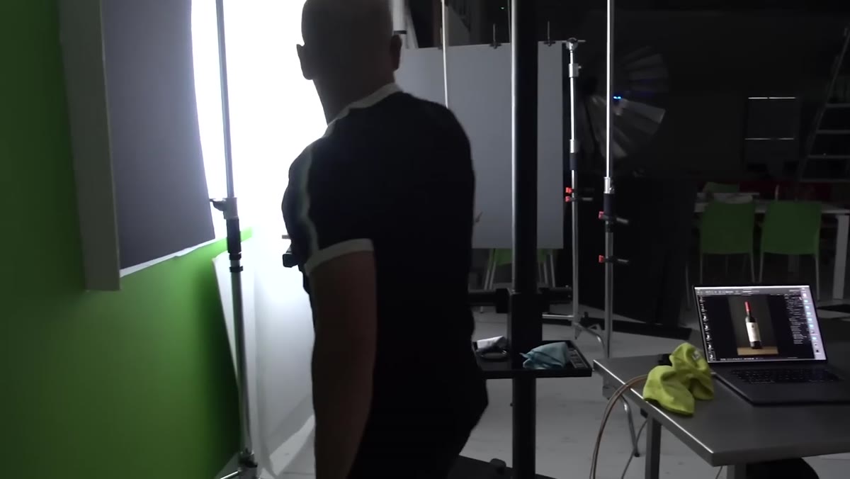 White foam board positioned to camera right of wine bottle