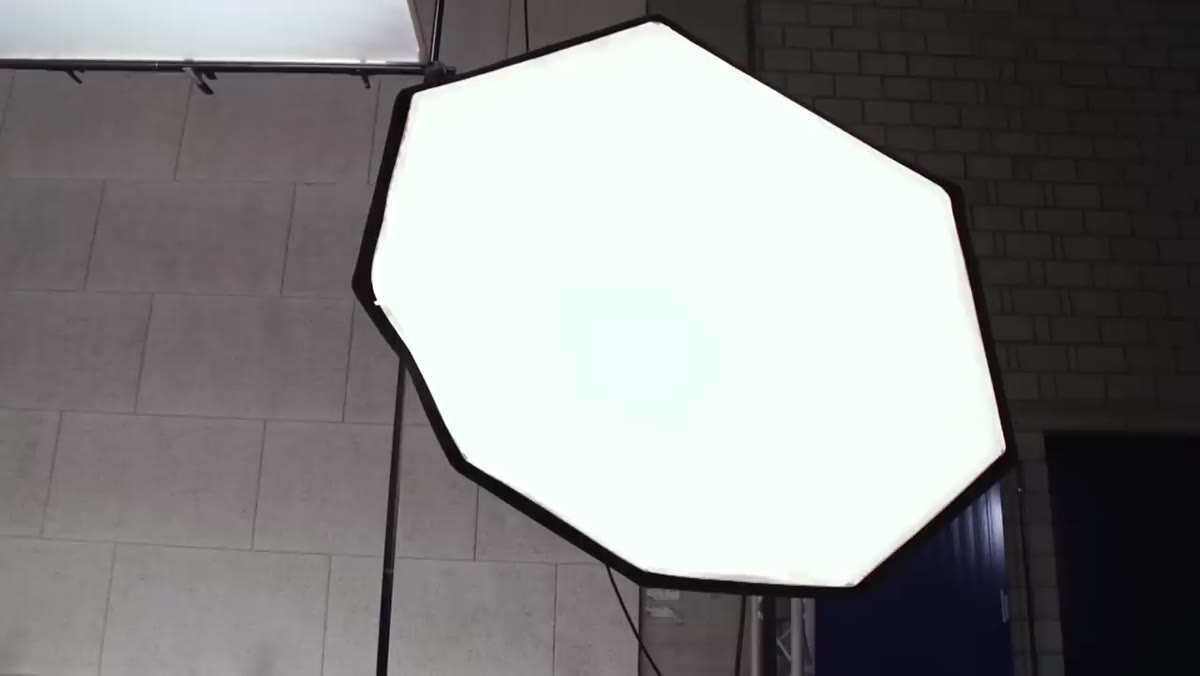 Second light positioned high, firing through diffusion screen