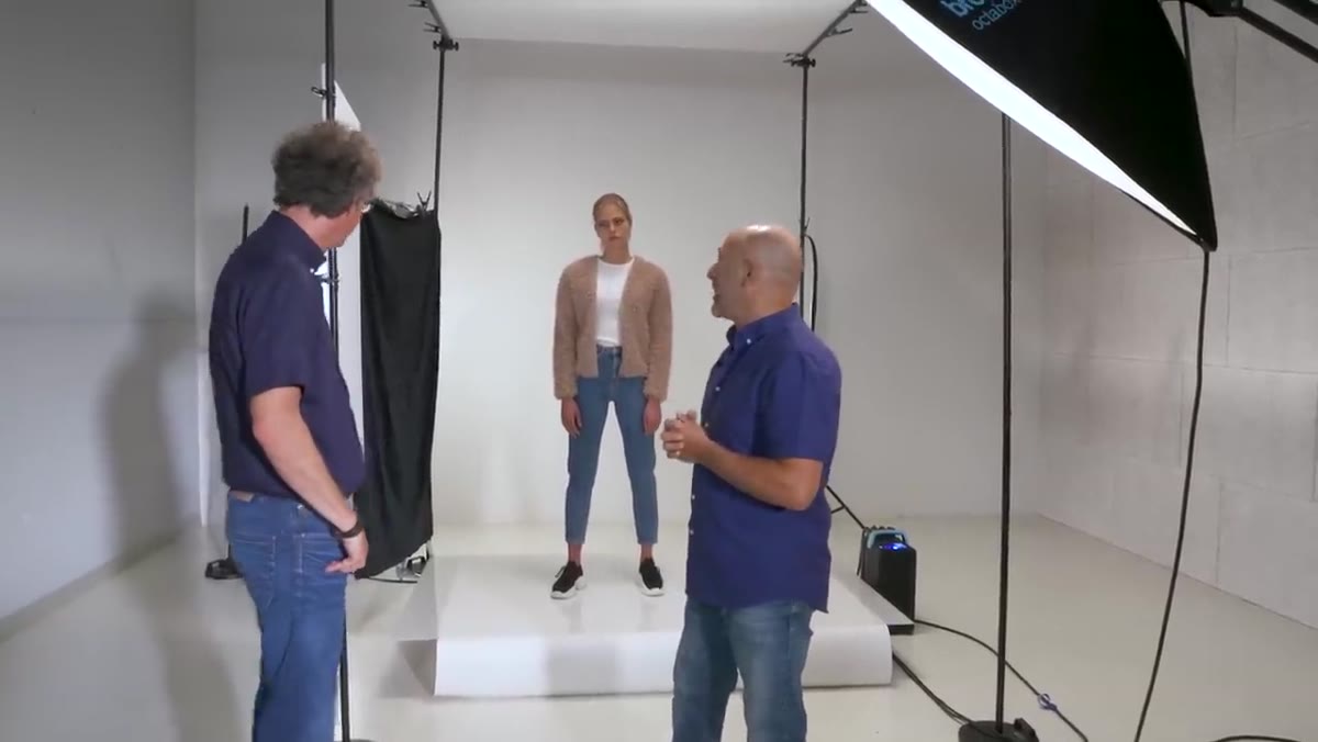 120cm softbox angled toward the subject, black curtain blocking spill