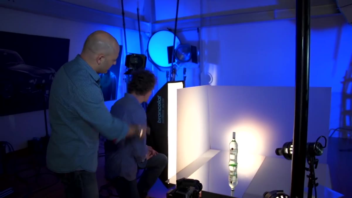 Softbox positioned beside bottle with frosted perspex panel