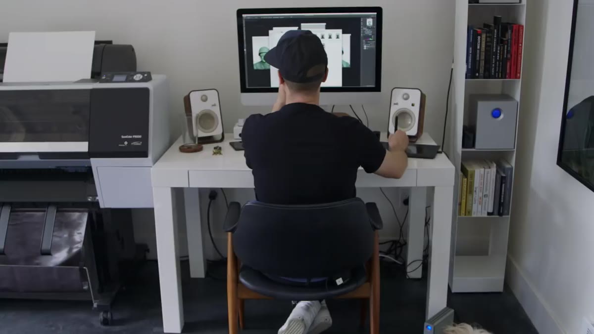 Editing workstation with dual monitors and active post-production work